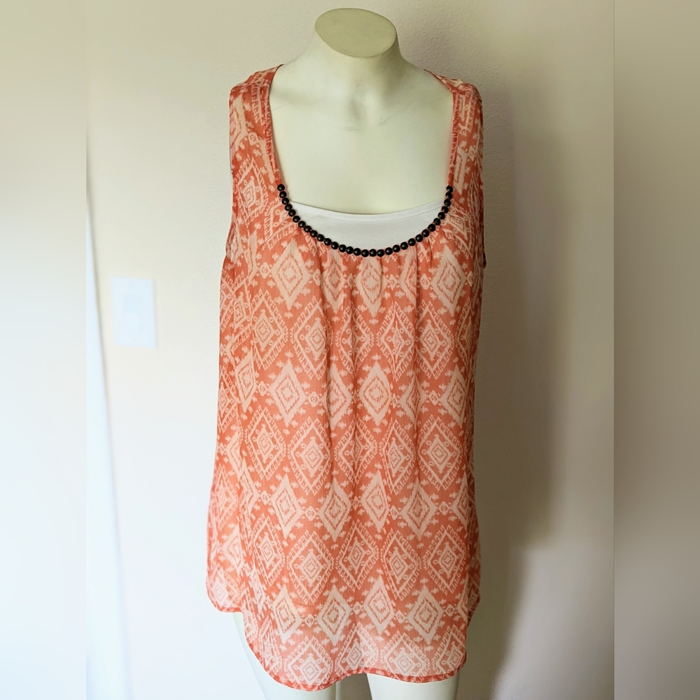 Sleeveless sheer coral summer blouse